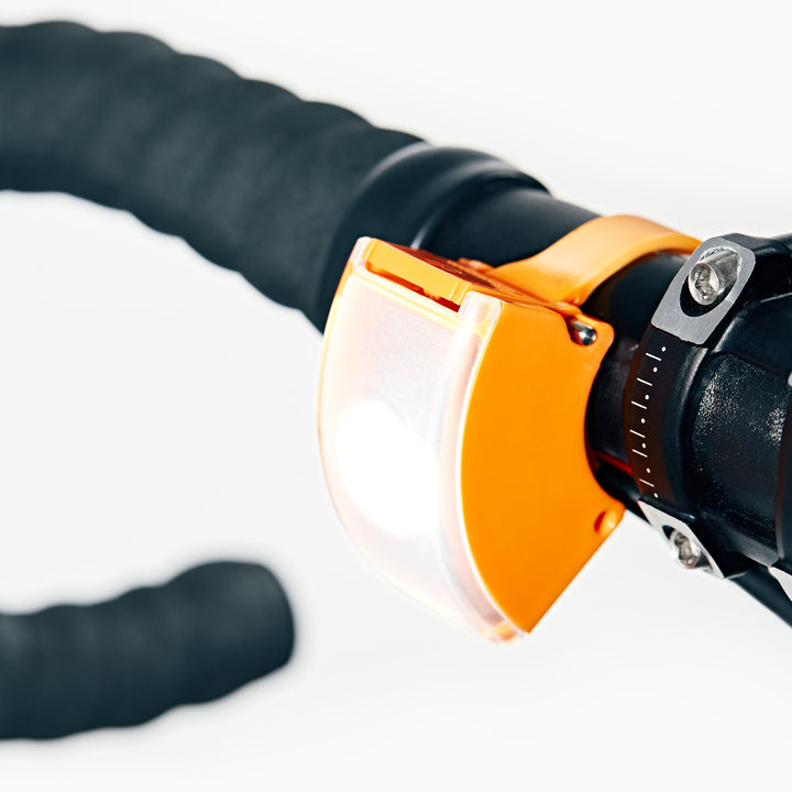 Curve front bicycle light on bike #color_orange