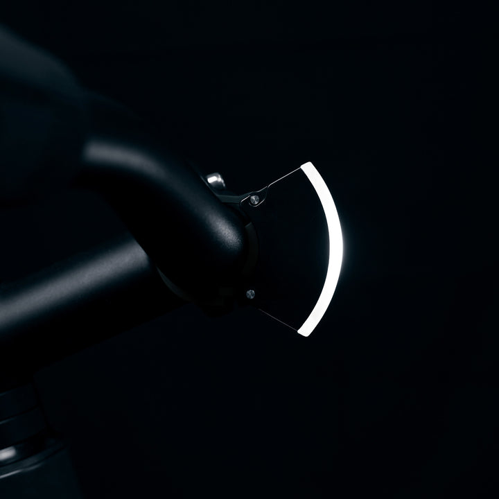 Curve front rechargeable bike light on bike #color_black