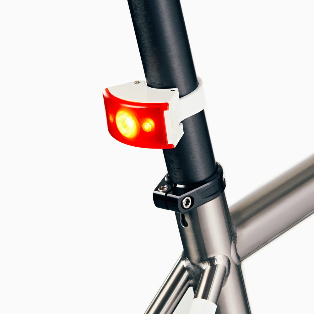 Curve rear rechargeable bike light on bike #color_white