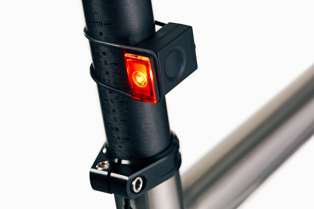 Block Rear bicycle light on saddle pole